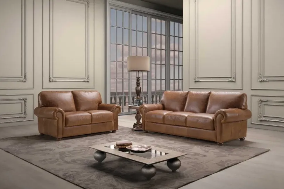 Divano in Pelle stile classico modello Coppia di divani mod.perugia rivestiti in pelle spessorata in promo con lo sconto del 35% scontato - 47%