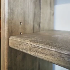 Libreria Outlet etnico in legno a prezzo scontato: scopri Liberai in vero legno con scala in stile industrial